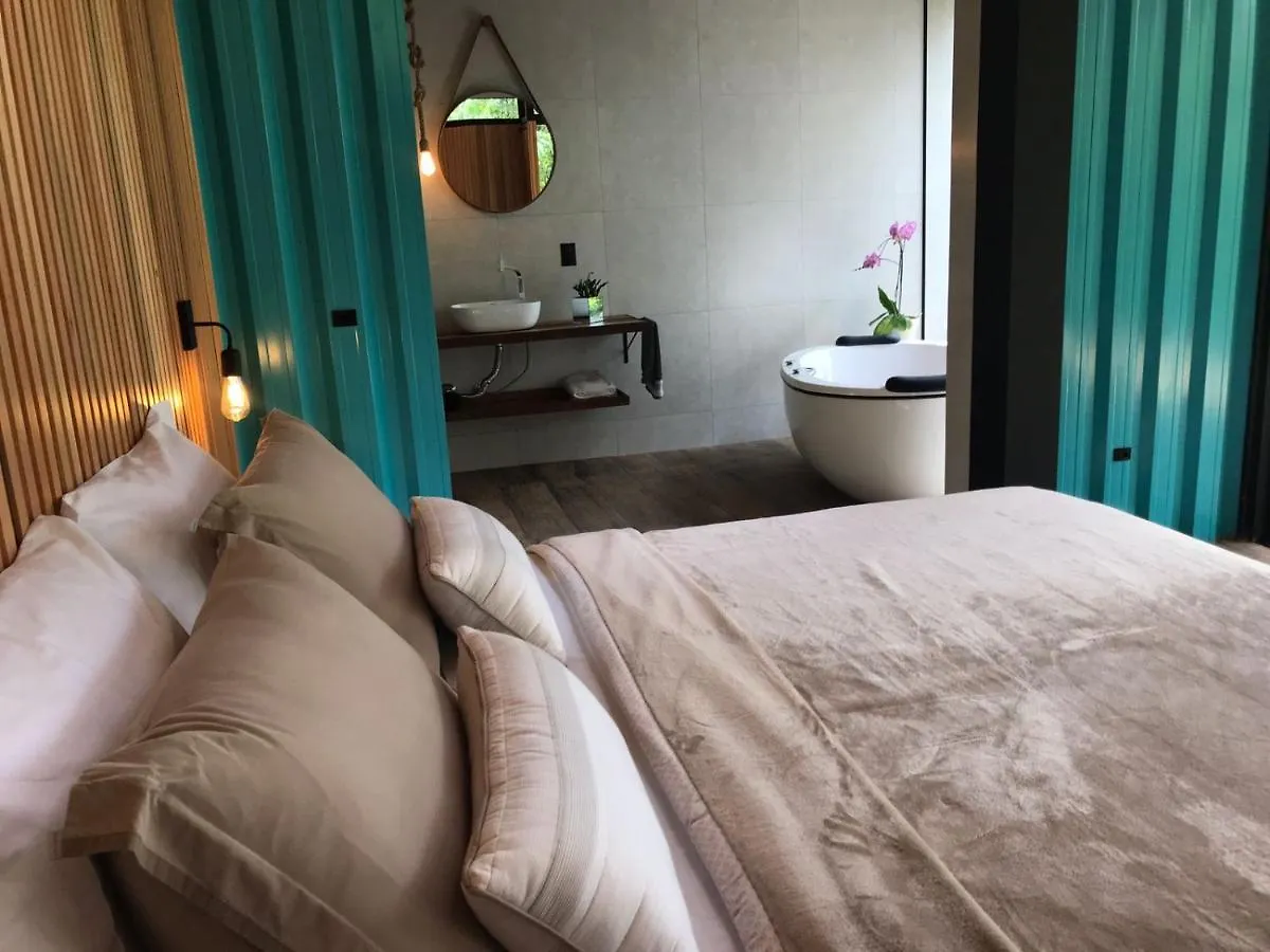 Quarto em Acomodações Particulares Pousada Sitio Raizes Sideropolis