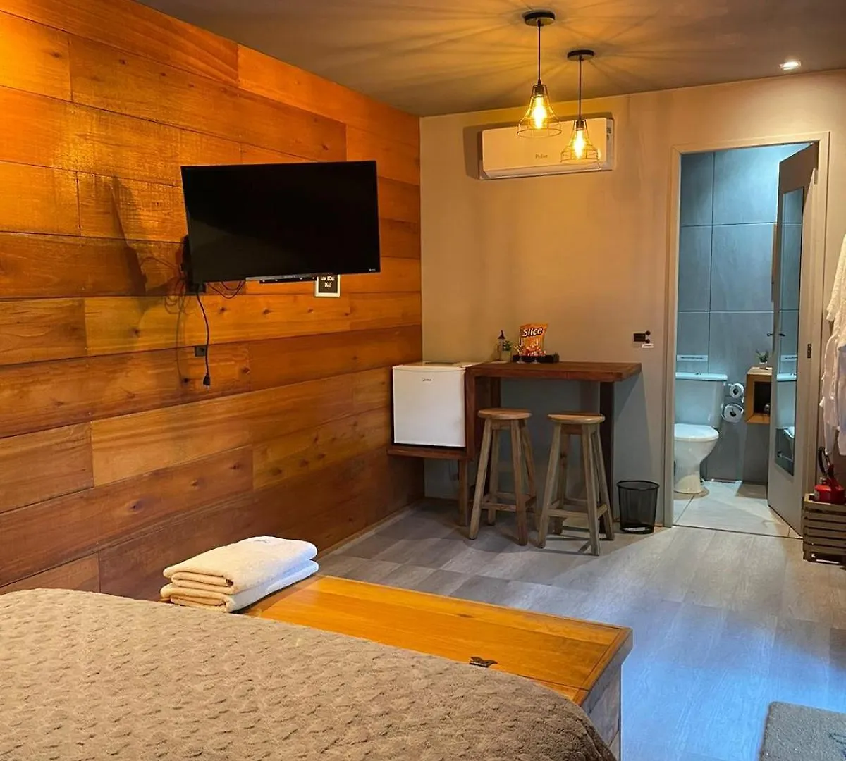 Quarto em Acomodações Particulares Pousada Sitio Raizes Sideropolis
